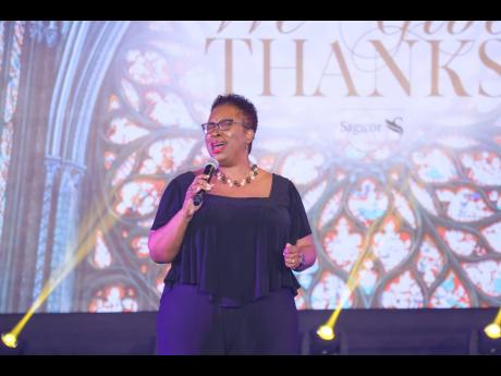 Special guest performer Andrea McCurdy gives a stirring performance during Sagicor Group Jamaica’s 50th-anniversary church service.