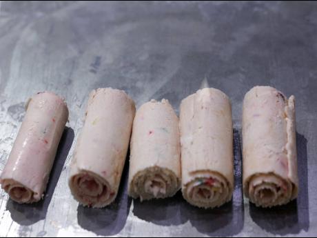 The hand-rolled ice cream is all rolled up.