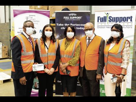 Jamaica’s High Commissioner Seth George Ramocan (second right) and wife Dr Lola Ramocan (right) are joined by (from left) Dr Errord Jarrett, director of the Jarrett Foundation; Lauryn Stoute of Full Support Healthcare; and Dr Pearl Jarrett, CEO of the Ja