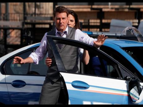 Actors Tom Cruise and Hayley Atwell appear during the filming of the movie ‘Mission: Impossible 7’ in Rome on October 13, 2020. Paramount Pictures has shut down shooting on the British set of the seventh installment of the film after someone tested pos