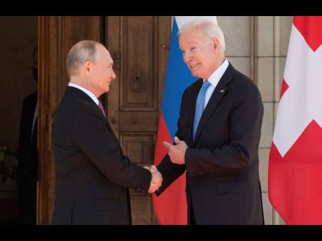 President Joe Biden and Russian President Vladimir Putin arrive to meet at the ‘Villa la Grange’ yesterday in Geneva, Switzerland. (AP)