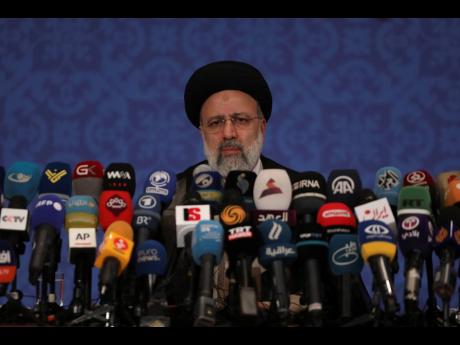 Iran’s new President-elect Ebrahim Raisi during a news conference in Tehran, Iran.