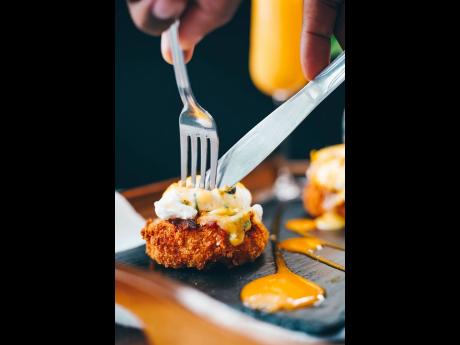 Credit: Contributed Take a bite of this tasty crab cake eggs benny.