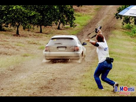 Sue-Ann Johnston could not contain her excitement on witnessing son, Kyle Gregg, competing in his first Rally Jamaica in 2011.Sue-Ann Johnston could not contain her excitement on witnessing son, Kyle Gregg, competing in his first Rally Jamaica in 2011.