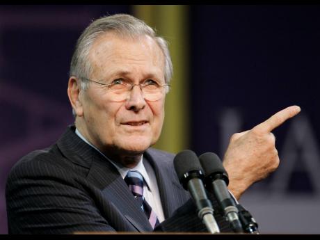 Credit: AP RUMSFELD