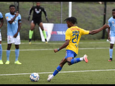 Harbour View’s Odorland Harding takes a direct free kick during the Jamaica Premier League match held at the UWI Captain Horace Burrell Centre of Excellence on Monday. The game ended in a 1-1 draw.