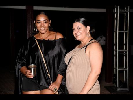 Credit: Nicholas Nunes/Photographer Guardian General Insurance’s vice-president of business development and marketing, Sheraley Bridgeman, and celebrity fashion designer Lisa ‘Neahlis’ McIntosh took a moment from dancing to have their picture taken.