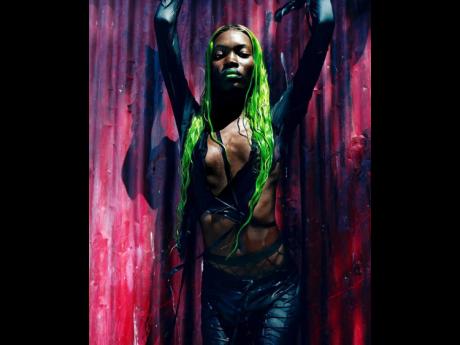 Credit: Luca Khouri Breana Carson wears a top and trousers from Acne Studios and Wolford fishnet tights.