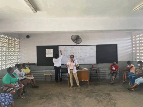 Credit: Contributed Sharon Gilzene, social worker and former education officer, conducts a parenting session with parents whose children attend the Dupont and Cockburn Gardens Primary schools.