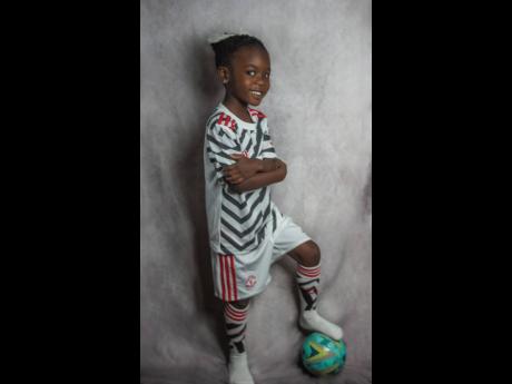 Five-year-old Kacey Peterkin, author of the book ‘We Can All Be Friends’.