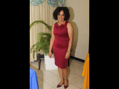 Rotarian Charmaine Grant made a bold statement in burgundy for the installation of her new president, Dr Kimberly Freeman.
