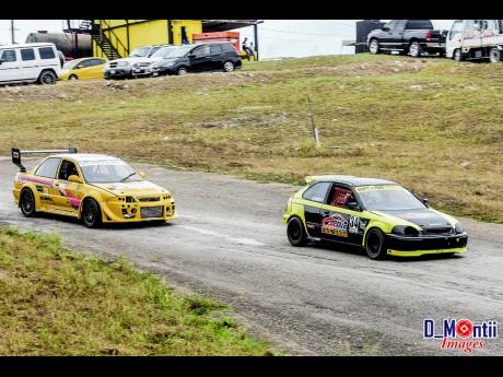 Ricardo Scott exiting the chicane at Dover Raceway and confronting the challenge of Jeff Larmond. 