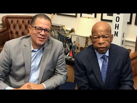 Jamaican John Eaves with civil rights leader Senator John Lewis.
