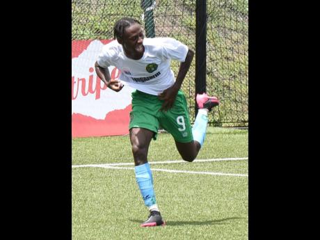 Vere United’s Ricardo Messam celebrates after scoring the first of his two goals in their 3-1 win over Clarendon rivals Humble Lion in the Jamaica Premier League at the UWI/JFF Captain Horace Burrell Centre of Excellence on Sunday.