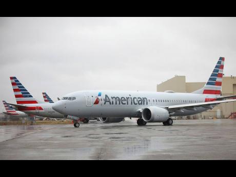 An American Airlines Boeing 737 Max taxis for take-off at Tulsa International Airport on December 2, 2020, in Tulsa, Oklahoma.