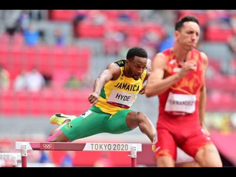 Jamaica's Jaheel Hyde clears a hurdle during the Men's 400m Hurdles heats at the Tokyo Olympic Games at the Tokyo Olympic Stadium, in Tokyo, Japan on Friday, July 30, 2021.