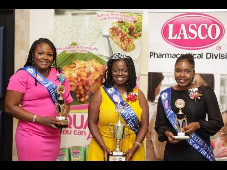 Student Nurse of the Year Alicia Vickers (centre) stands with first runner-up Sashanna Simmonds (left) and second runner-up Rochelle McKoy after being declared the winner at this year’s staging of the competition.
