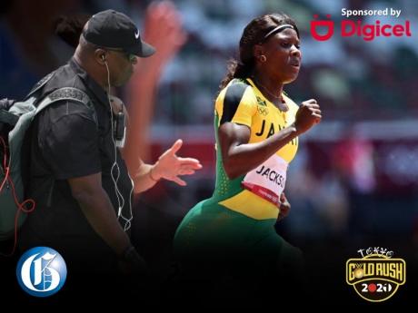 MVP Track Club coach Stephen Francis (left) and sprinter Shericka Jackson.