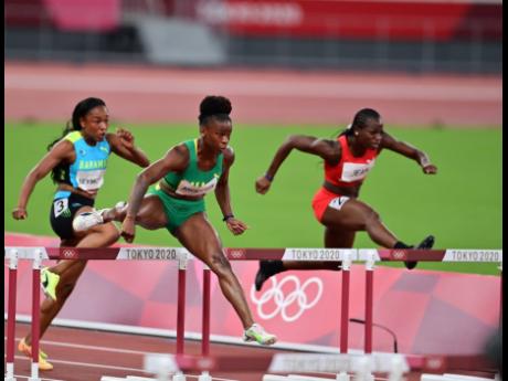 Jamaica’s Britany Anderson (centre) competing in the women’s 100 metres hurdles semi-final at the Tokyo 2020 Olympics at the Tokyo Olympic Stadium in Tokyo, Japan, on Sunday.