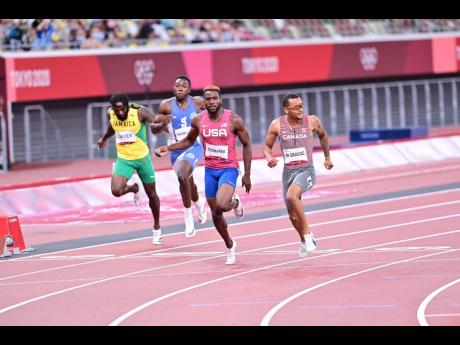 Credit: Gladstone Taylor Canada's Andre de Grasse (right) crosses the line ahead of the USA's Kenneth Bednarek (second right) to win the Men's 200m final at the Olympic Games in Tokyo, Japan on Wednesday. Also pictured are Jamaica's Rasheed Dwyer (left), and Liberia's Joseph Fahnb