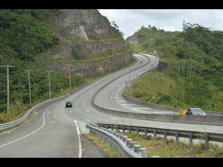 
Motorists traversing the North-South Highway that links St Catherine to St Ann.
