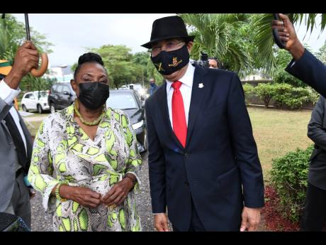 Credit: Rudolph Brown Sir Patrick Allen (right), governor general of Jamaica, and Olivia Grange, minister of culture, gender, entertainment and sport, put their best foot forward at Tuesday’s wreath-laying ceremony.