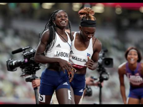 Namibia's Christine Mboma (left) and Beatrice Masilingi at the end of the Women's 200m final at the Olympic Games in Tokyo, Japan on Tuesday, August 3.