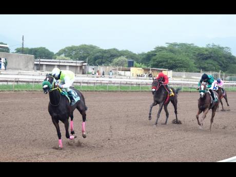 LABYCKA, ridden by Jordan Barrett, wins the CAYMANAS PARK 1959 over a mile at Caymanas Park in St Catherine yesterday.