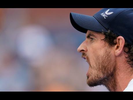 Credit: AP Andy Murray, of Great Britain, reacts after scoring a point against Stefanos Tsitsipas, of Greece, during the first round of the US Open tennis championships on Monday in New York. Murray lost 2-6, 7-6 (7), 3-6, 6-3, 6-4.