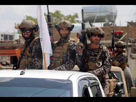 Taliban special force fighters arrive inside the Hamid Karzai International Airport after the US military’s withdrawal, in Kabul, Afghanistan, on Tuesday. 