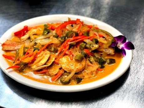 This savour-to-the-bone steamed fish comes with all the fillings: okra, carrot and, of course, water crackers. 