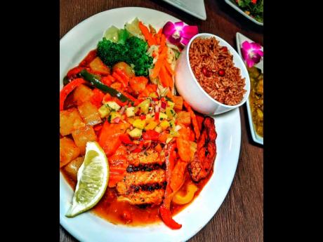 Excite your taste buds with this tropical dish: pineapple jerk salmon.