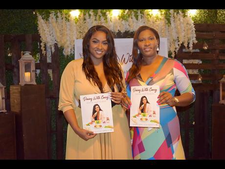 The Curvy Diva (left) is joined by her publisher, Ingrid Abrahams Larmond, chief operating officer of Pageturner Publishing House Limited.
