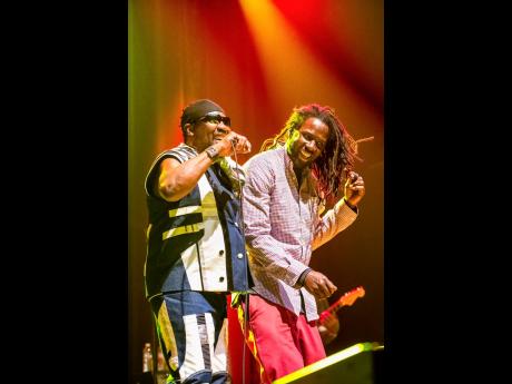 
The late Frederick Nathaniel ‘Toots’ Hibbert (left) and son, Clayton ‘Junior Toots’ Hibbert. Junior Toots says it has been a challenging 12 months as he adjusts to life without his father.
The late Frederick Nathaniel ‘Toots’ Hibbert (left) an