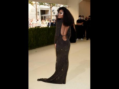 Credit: AP Keke Palmer wore a stunning, earth-tone body hugger with a train.