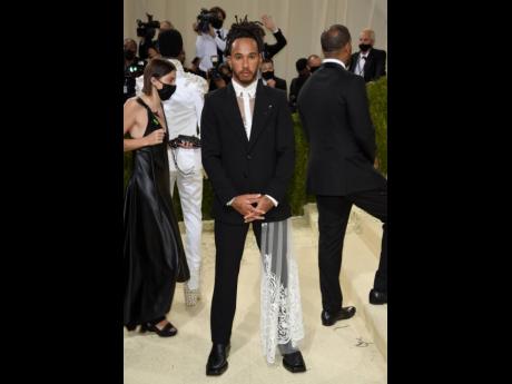 British race-car driver Lewis Hamilton wore American designer Kenneth Nicholson. 