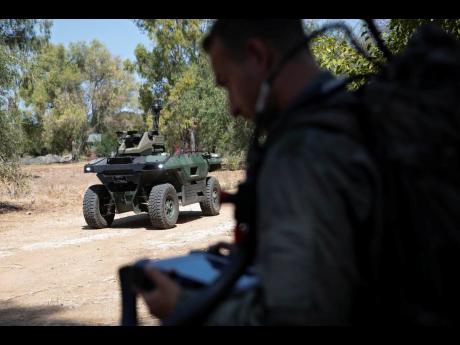 Israel Aerospace Industries’ semi-autonomous four-wheel-drive ‘REX MKII’ is seen at an IAI facility near the central Israeli city of Lod on September 9.