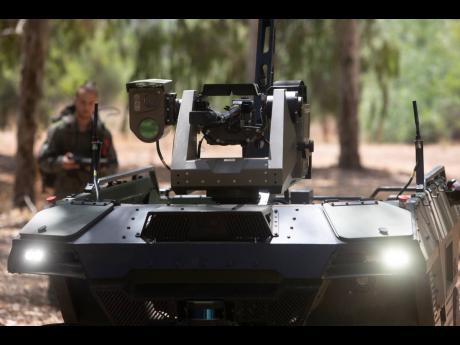 Israel Aerospace Industries' semi-autonomous four-wheel-drive 'REX MKII' is seen at an IAI facility near the central Israeli city of Lod on September 9.