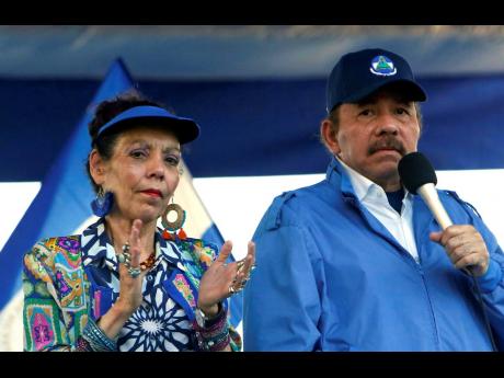 In this September 5, 2018. photo, Nicaragua's President Daniel Ortega and his wife, Vice President Rosario Murillo, lead a rally in Managua, Nicaragua. As international health organisations warn of increasing infections in Nicaragua and independent Nicarag