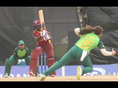 Rashada Williams (centre) of the West Indies Women’s team in action against South Africa in the third One Day International at the Coolidge Cricket Ground in St John’s, Antigua, on Monday.
