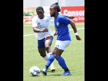 File
Mount Pleasant’s Kemar Beckford (right).