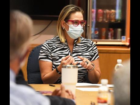 US Sen Kyrsten Sinema, D-Arizona, speaks inside the Yuma International Airport conference room at the start of a round-table discussion of the bipartisan Infrastructure Investment and Jobs Act, Monday, Aug 23, 2021, in Yuma, Ariz. (Randy Hoeft/The Yuma Sun