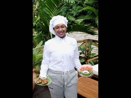 Head Chef Terri-Ann Jarrett showcasing the spicy crab back, served with a  festive salad. 