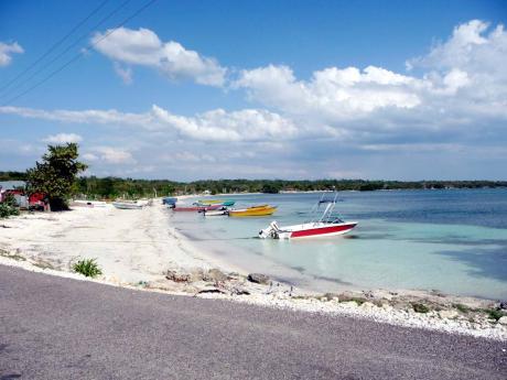 The Little Bay cove in Westmoreland is lined by the south coast’s most beautiful remaining white sand beaches.