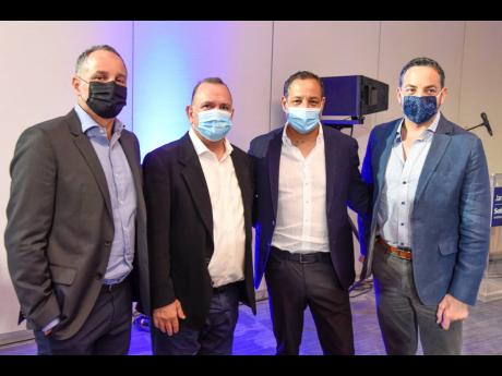 From left: Alexander Melville co-owner of Sotheby’s International Realty Jamaica; Francisco Angulo VP, global business development, Realogy; Marc Melville, owner Chukko Caribbean; and Daniel Melville, managing director, Tropical Battery, are all camera-r