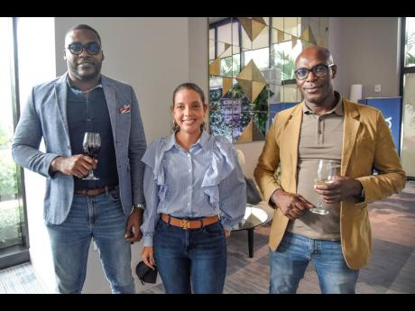 Gregory Samuels (left), executive director and head of corporate advisory, Sygnus Capital; Elizabeth James (centre), head of wealth management,  and Berisford Grey, co-founder and CEO, enjoy being ‘outside’ at the recent launch of Sotheby’s Internati