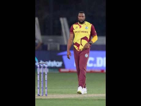 
West Indies’ captain Kieron Pollard reacts after England defeated his team during the Cricket T20 World Cup match against England at the Dubai International Cricket Stadium, in Dubai, UAE, yesterday. England won the game by 6 wickets.