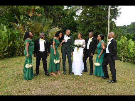 From left: Jasset Lyle-Robinson, Allen ‘Andy’ Robinson, Sara-Mae Hazle, Demar Lyle, Stephanie Hazle-Lyle, Javis Lyle, Tara Osbourne and Gregory Tomlinson are caught sharing a laugh following the nuptials.