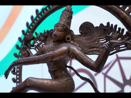 Some of the stolen objects being returned to India, including this bronze Shiva Nataraja valued at $4 million, are displayed during a ceremony at the Indian consulate in New York.
