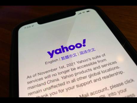 A smartphone shows the homepage of Yahoo when accessed inside China in Beijing, China, Tuesday, November 2, 2021.